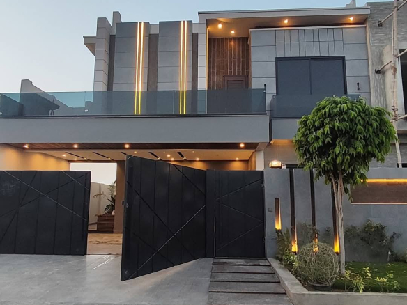 10 Marla Triple Story Fresh Kothi for Sale Demand: Rs. 5 Crore New Defense View Housing Society Dera Ghazi Khan