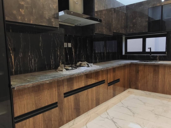 10 Marla Triple Story Fresh Kothi for Sale Demand: Rs. 5 Crore New Defense View Housing Society Dera Ghazi Khan